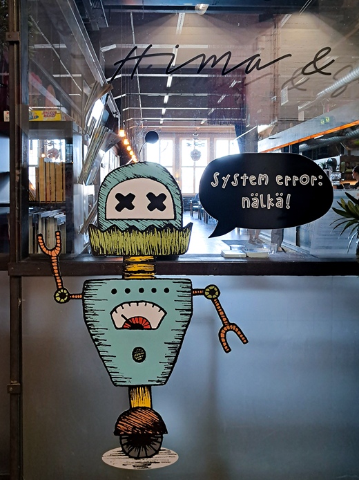 Ravintolan lasissa oleva robottiteippaus